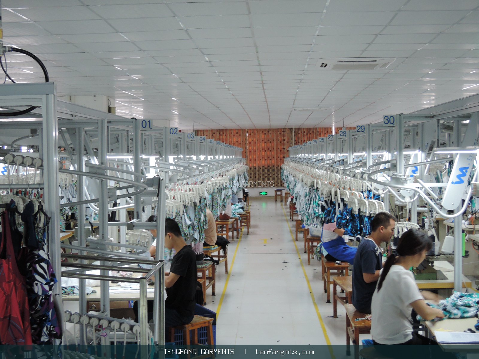 Production team and garment manufacturing floor